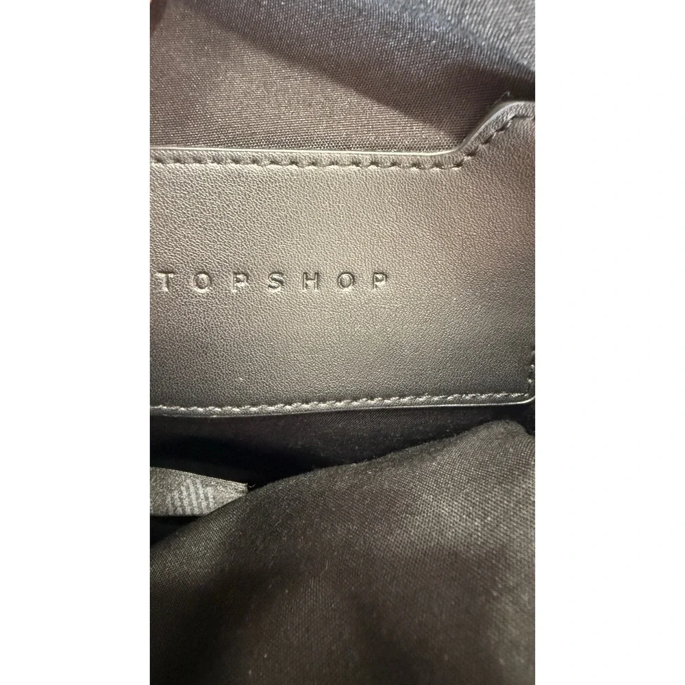 TopShop Black Nylon Sling Bag Crossbody Backpack Adjustable Silver Hardware